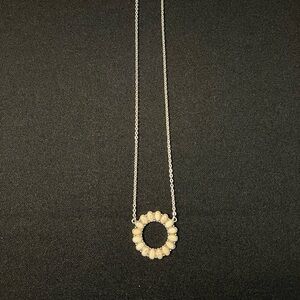 Plunder Silver and Cream Necklace with Sunburst Pendant